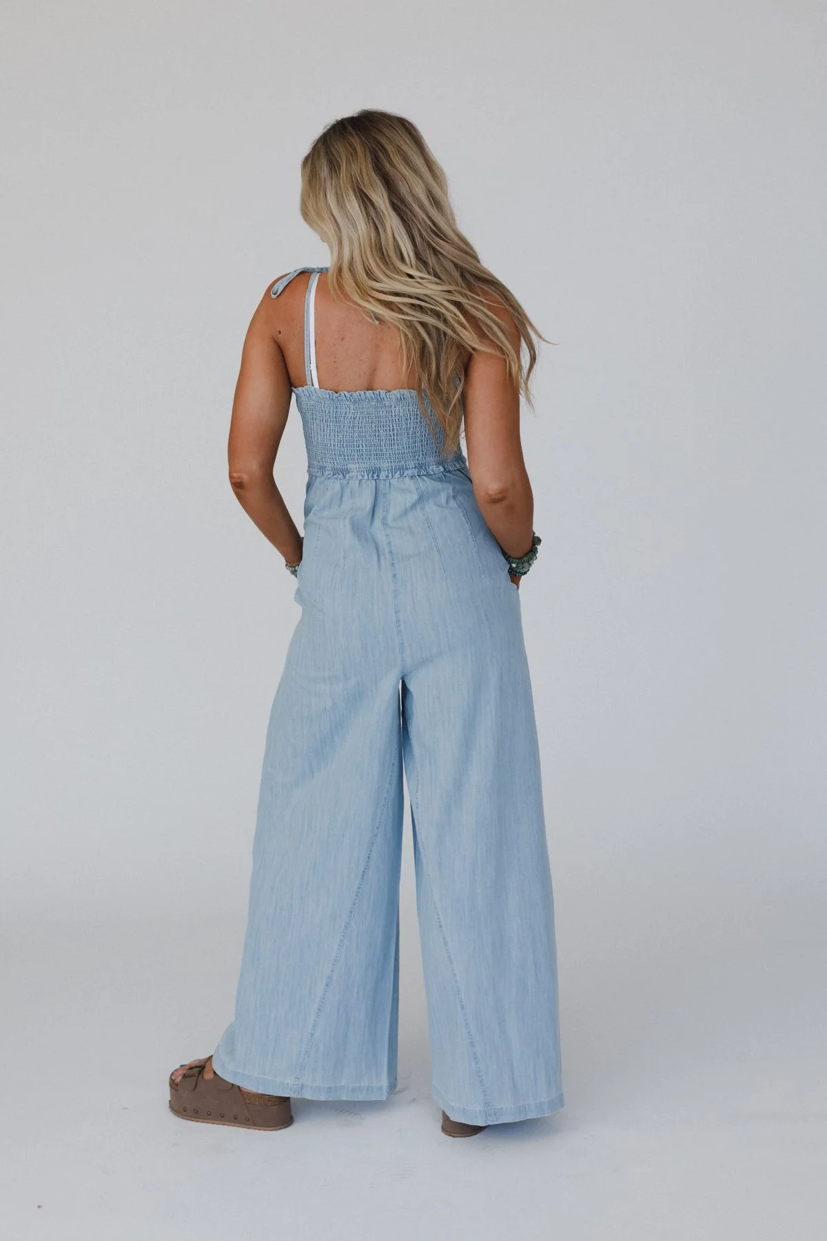 The Nest Last Call Smocked Jumpsuit - Light Wash - Image 7